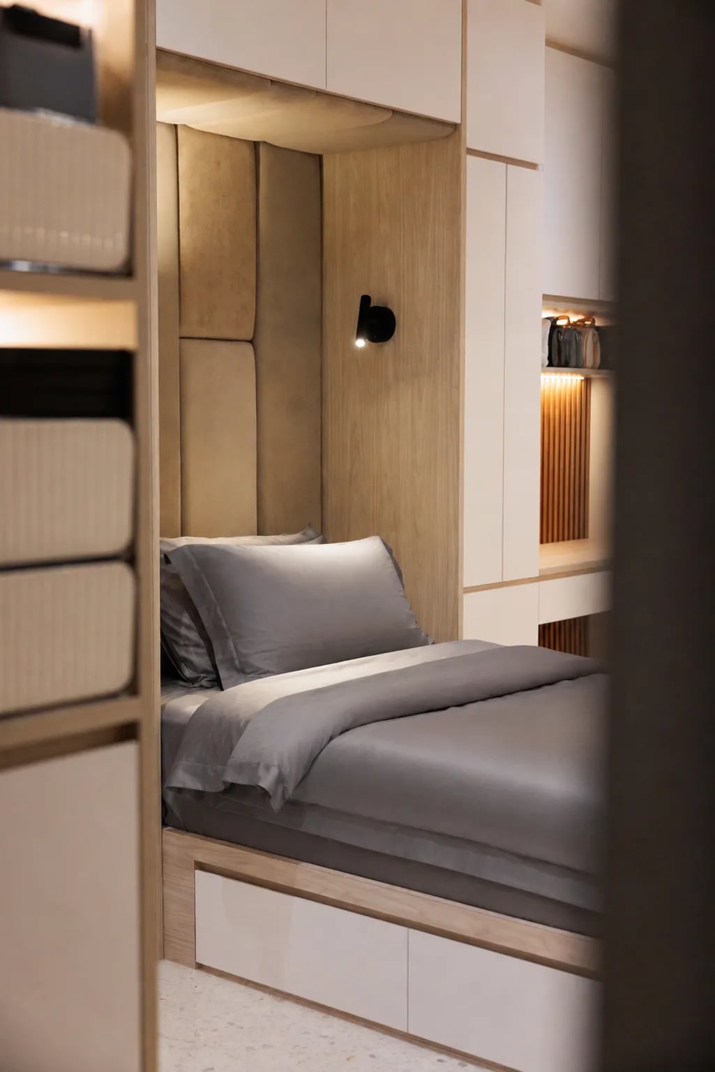 Common bedroom with bed, upholstery, cabinets